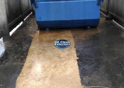 commercial power washing of a concrete dumpster pad in West Long Branch, NJ