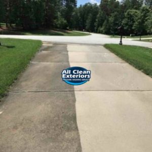 power washing cleaning of a concrete driveway with pressure washing in Little Silver, NJ