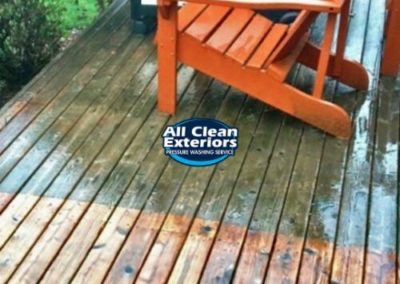 cleaning a wooden deck and chair with power washing in Oceanport, NJ